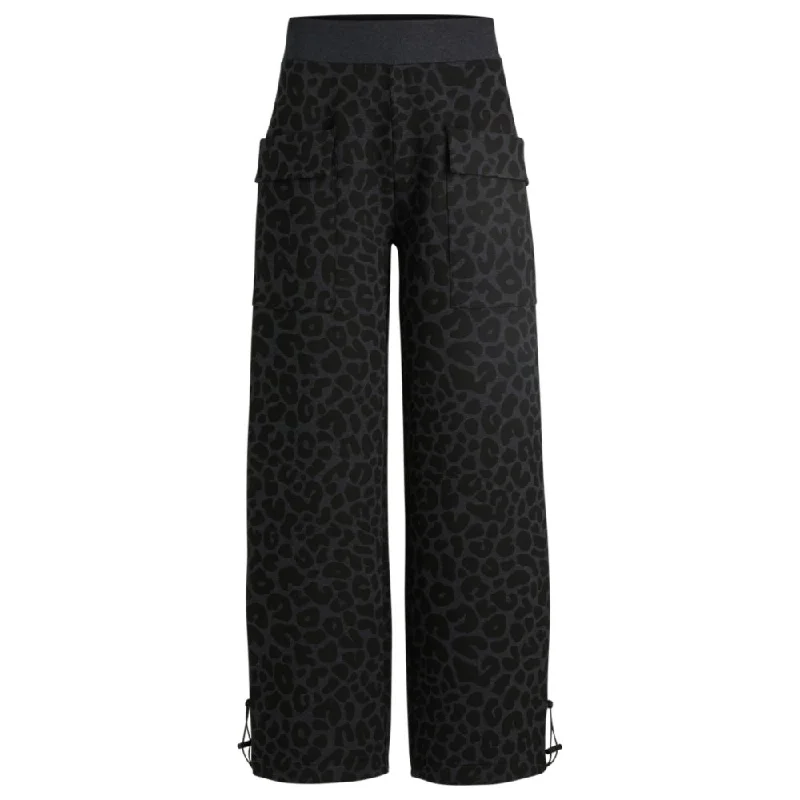 Warm Chic NAOMI x BOSS animal-print tracksuit bottoms with energear